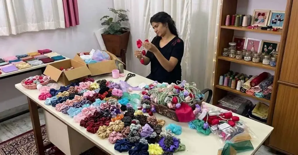 Indian woman making handmade scrunchies and craft products for a small home business